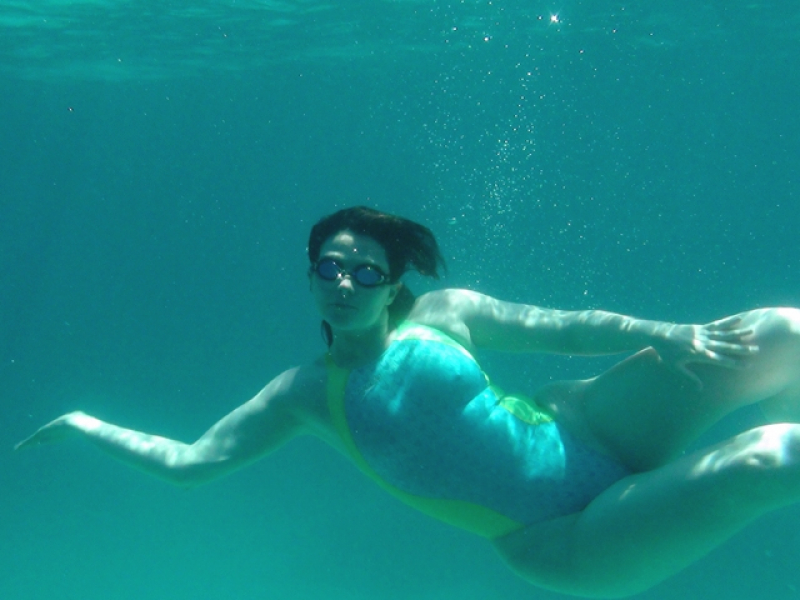 Swimming in the ocean wear a swimsuit HD
