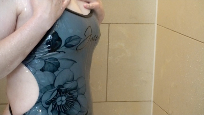 New grey flower swimsuit gets wet in shower